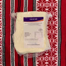 Traditional sheep's milk Cas de Sibiu cheese from Asociatia Producatorilor de Telemea de Sibiu, showcasing its creamy texture and rind