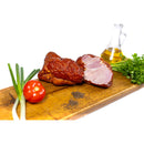 Smoked deboned ham from Delumani, a traditional Romanian deli meat displayed on a cutting board.